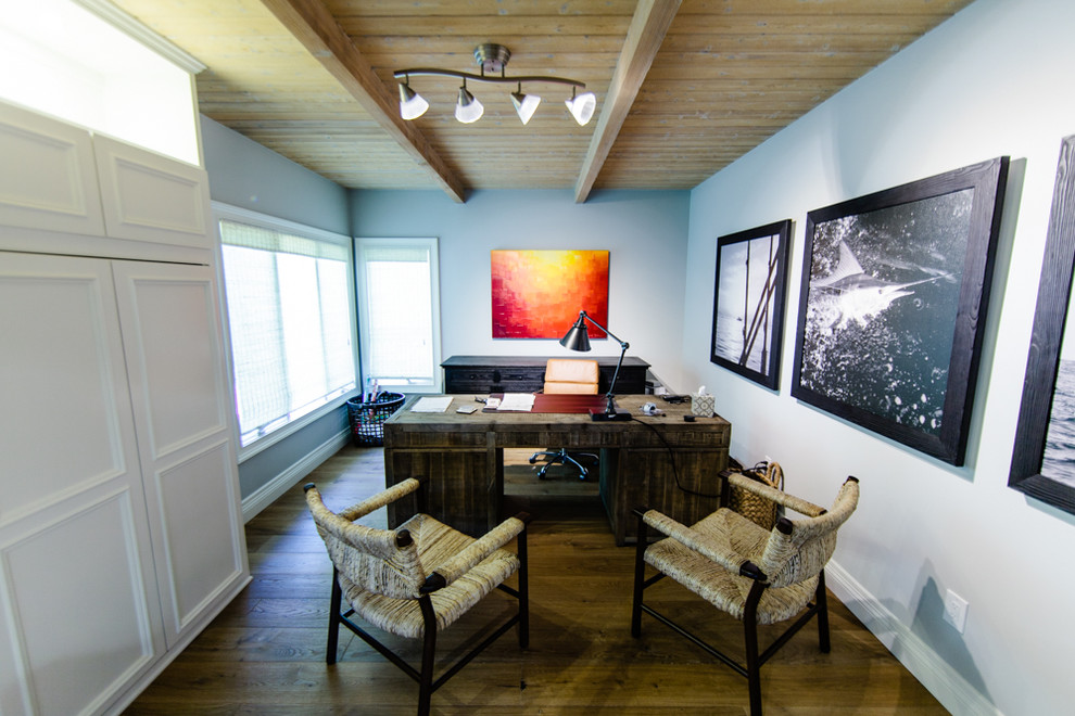 This is an example of a beach style home office in Orange County.