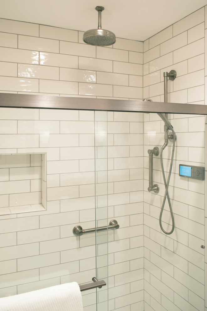 Alcove shower - mid-sized transitional master beige tile and subway tile alcove shower idea with beige walls