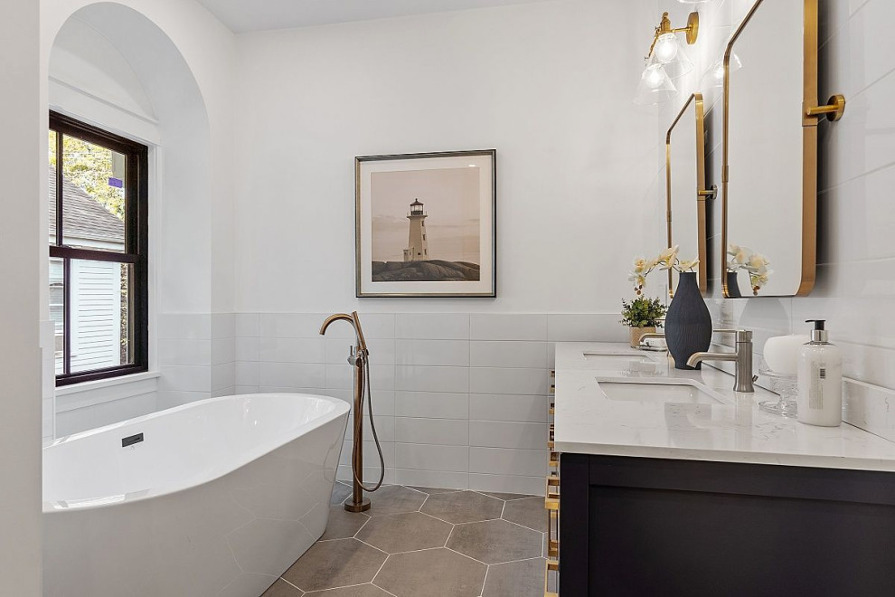Inspiration for a large country master bathroom in Boston with shaker cabinets, blue cabinets, a freestanding tub, an alcove shower, a two-piece toilet, white tile, ceramic tile, white walls, an undermount sink, engineered quartz benchtops, grey floor, an open shower, white benchtops, a double vanity and a built-in vanity.