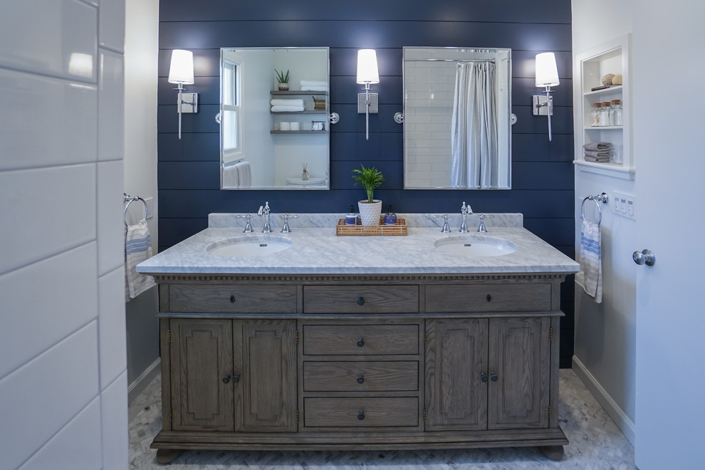 Design ideas for a small country bathroom in San Francisco with furniture-like cabinets, medium wood cabinets, a drop-in tub, a one-piece toilet, white tile, subway tile, white walls, mosaic tile floors, an integrated sink, marble benchtops, grey floor and grey benchtops.