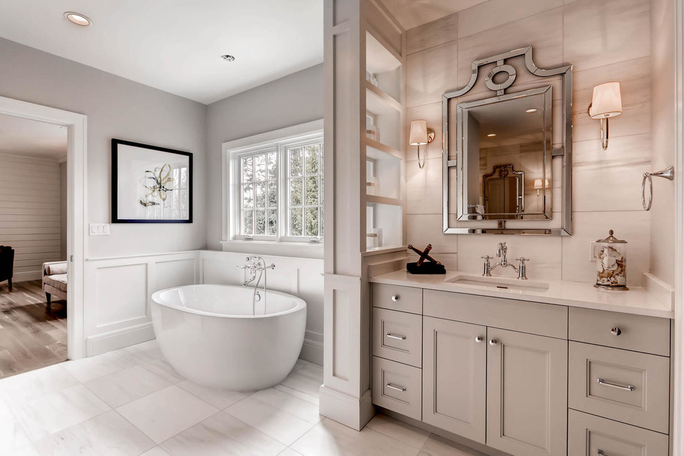 Transitional bathroom in Denver with a freestanding tub.
