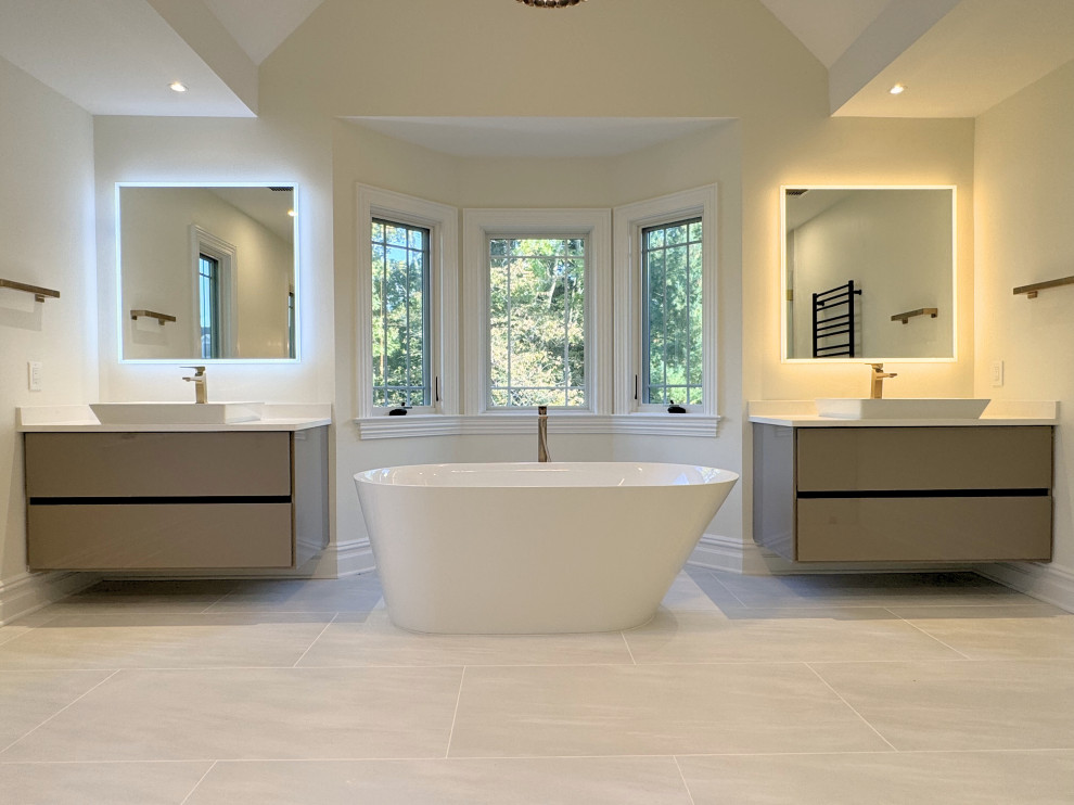 Freestanding Tub Between Twin Vanities