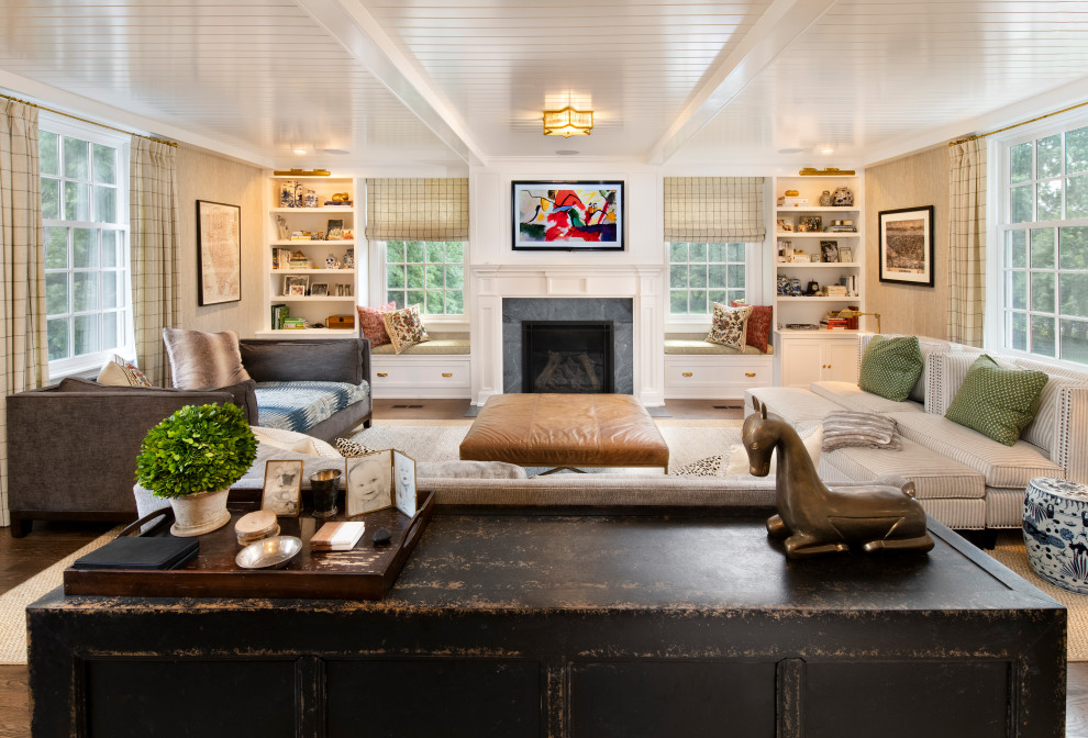 Traditional formal open concept living room in Philadelphia with medium hardwood floors, a standard fireplace, a stone fireplace surround, brown floor and a built-in media wall.