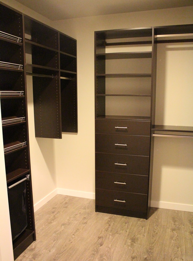 Inspiration for a small contemporary storage and wardrobe in Calgary.