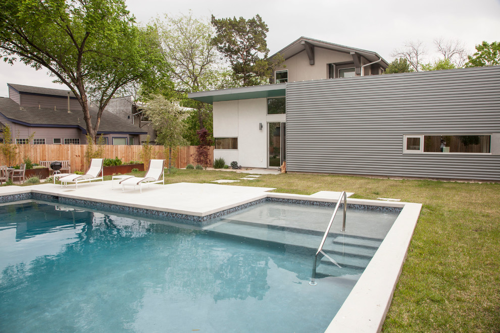 This is an example of a contemporary l-shaped pool in Austin.