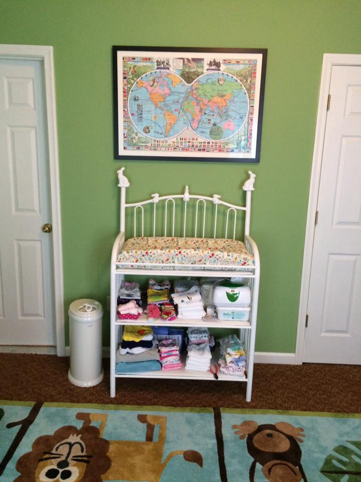 Mid-sized transitional gender-neutral nursery in Baltimore with green walls and carpet.