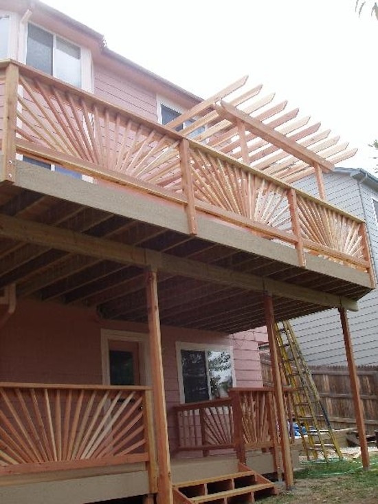 Transitional deck photo in Denver