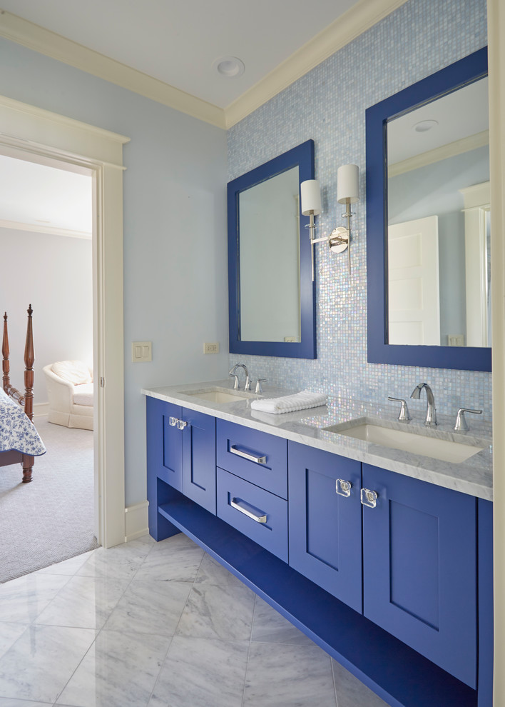 Design ideas for a small traditional master bathroom in Chicago with shaker cabinets, blue cabinets, blue tile, glass sheet wall, blue walls, marble floors, an undermount sink, marble benchtops, grey floor and grey benchtops.
