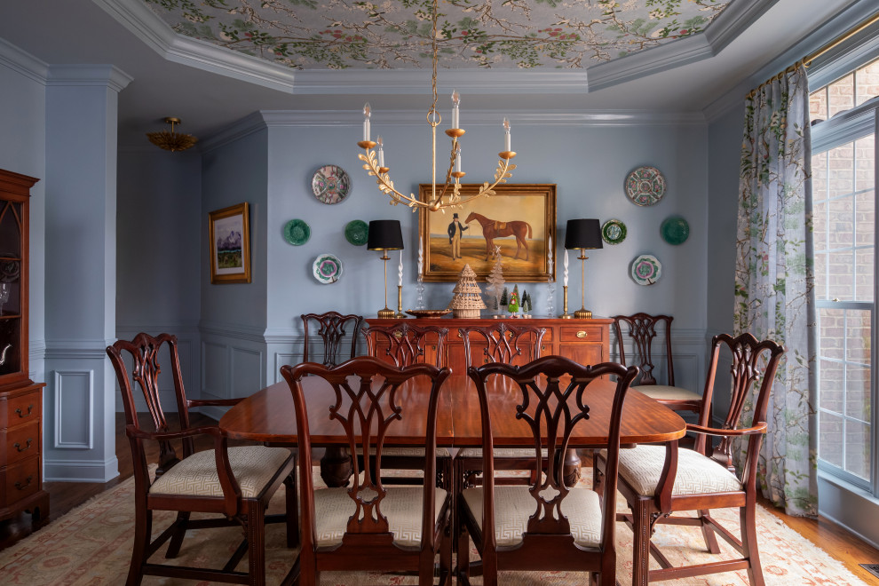 Example of a classic dining room design in Raleigh