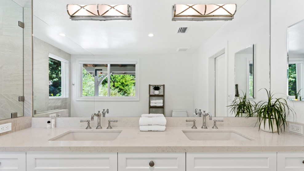 Huge transitional master white tile and porcelain tile porcelain tile and beige floor bathroom photo in Los Angeles with a wall-mount toilet, white walls, an undermount sink, quartzite countertops and beige countertops
