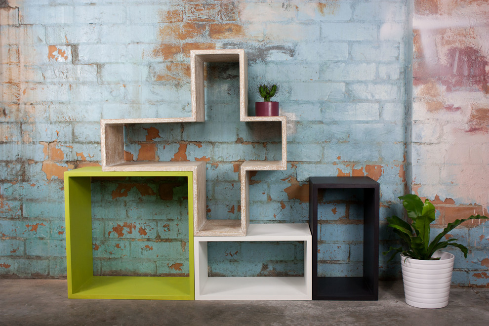 Photo of a mid-sized contemporary living room in Melbourne with multi-coloured walls and concrete floors.