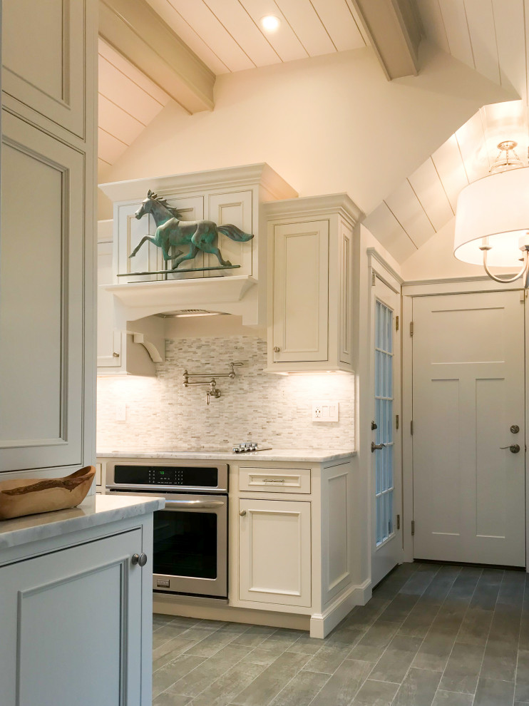 Small transitional u-shaped vaulted ceiling eat-in kitchen photo with beaded inset cabinets, white cabinets, paneled appliances and no island