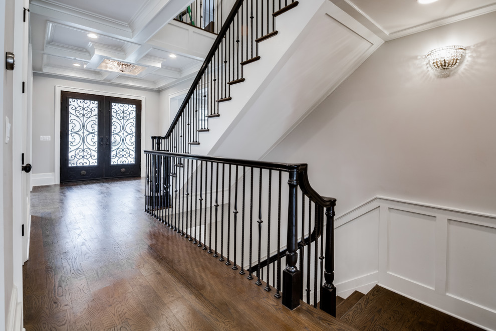Inspiration for a mid-sized traditional wood l-shaped staircase in DC Metro with wood risers and mixed railing.