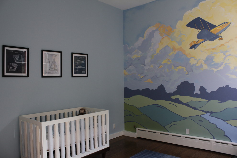 Inspiration for a mid-sized midcentury nursery for boys in New York with multi-coloured walls, dark hardwood floors and brown floor.