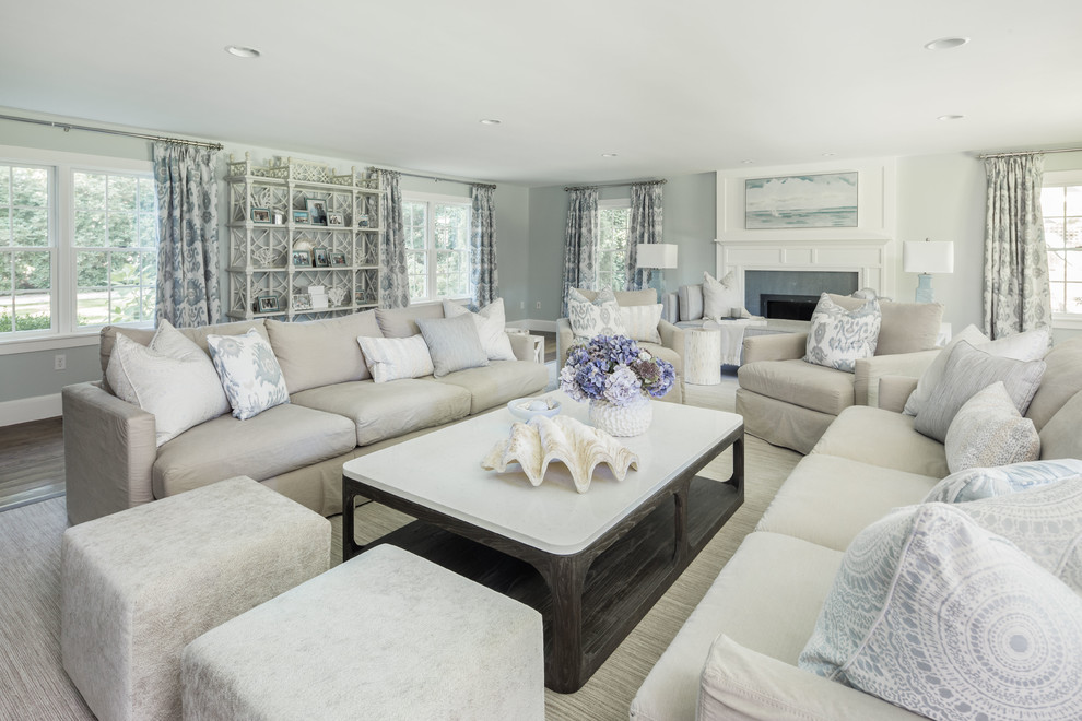 Photo of a beach style formal living room in Boston with grey walls, a standard fireplace, a stone fireplace surround and no tv.