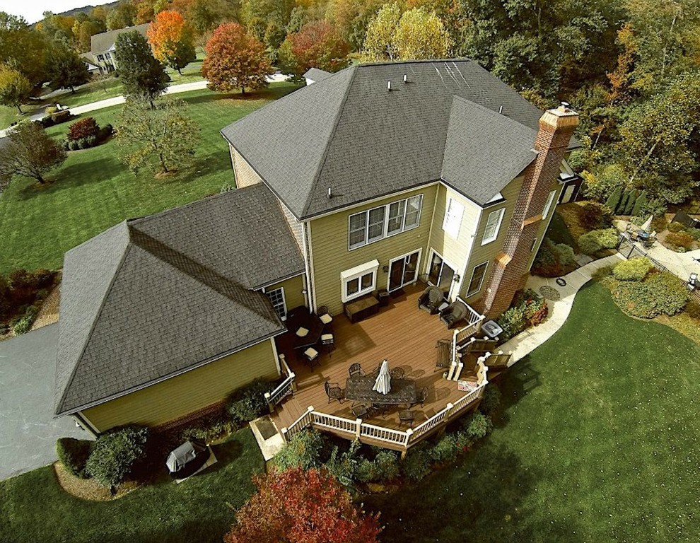 Large transitional backyard deck photo in Baltimore with no cover