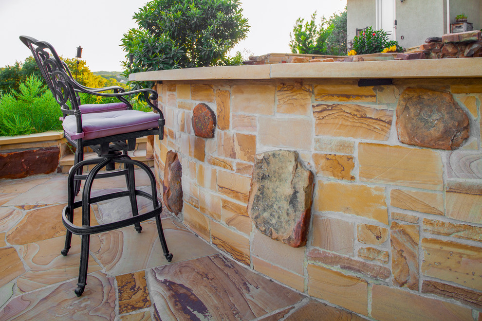 Mountain style home design photo in Austin