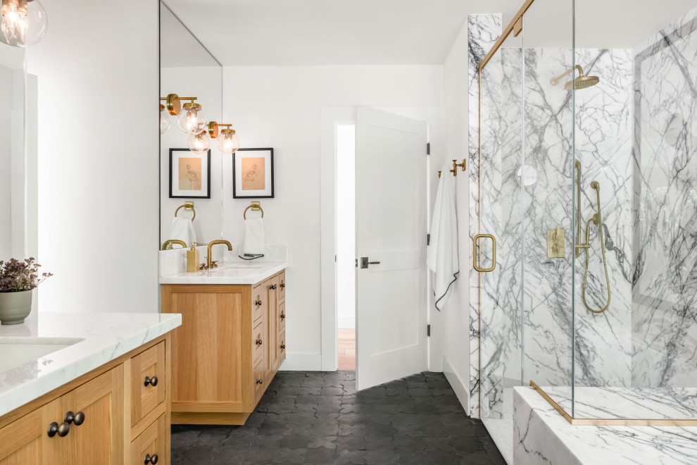 Design ideas for a mediterranean ensuite bathroom in San Francisco with shaker cabinets, medium wood cabinets, a submerged bath, an alcove shower, marble tiles, white walls, a submerged sink, marble worktops, black floors, a hinged door, multi-coloured worktops, double sinks and a built in vanity unit.