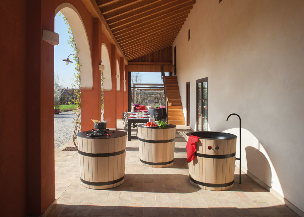 Idées déco pour une terrasse campagne avec une cuisine d'été.