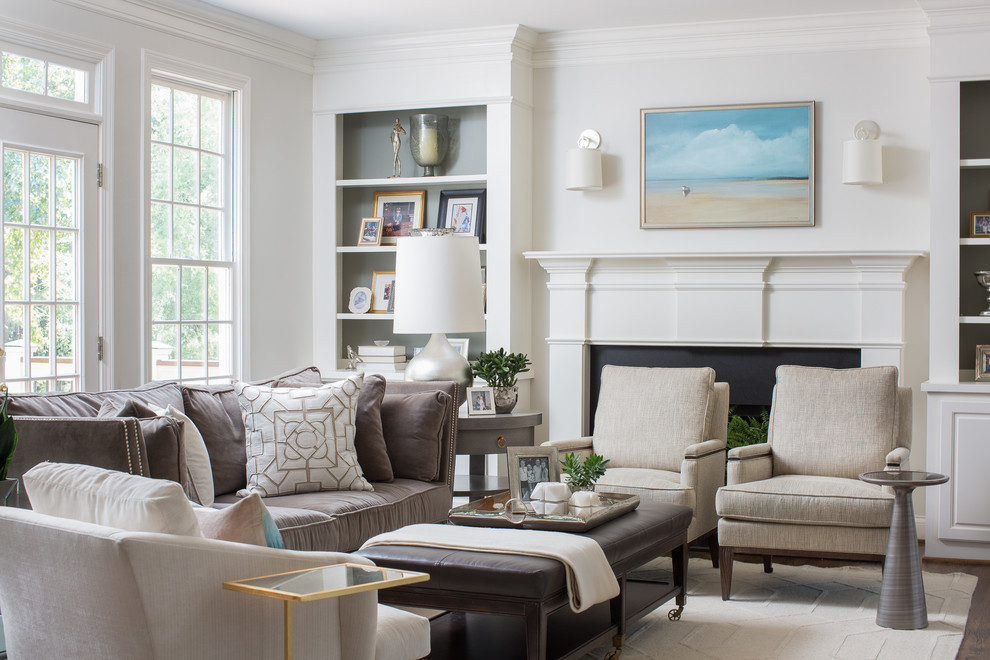 Design ideas for a transitional open concept living room in Atlanta with a standard fireplace and white walls.