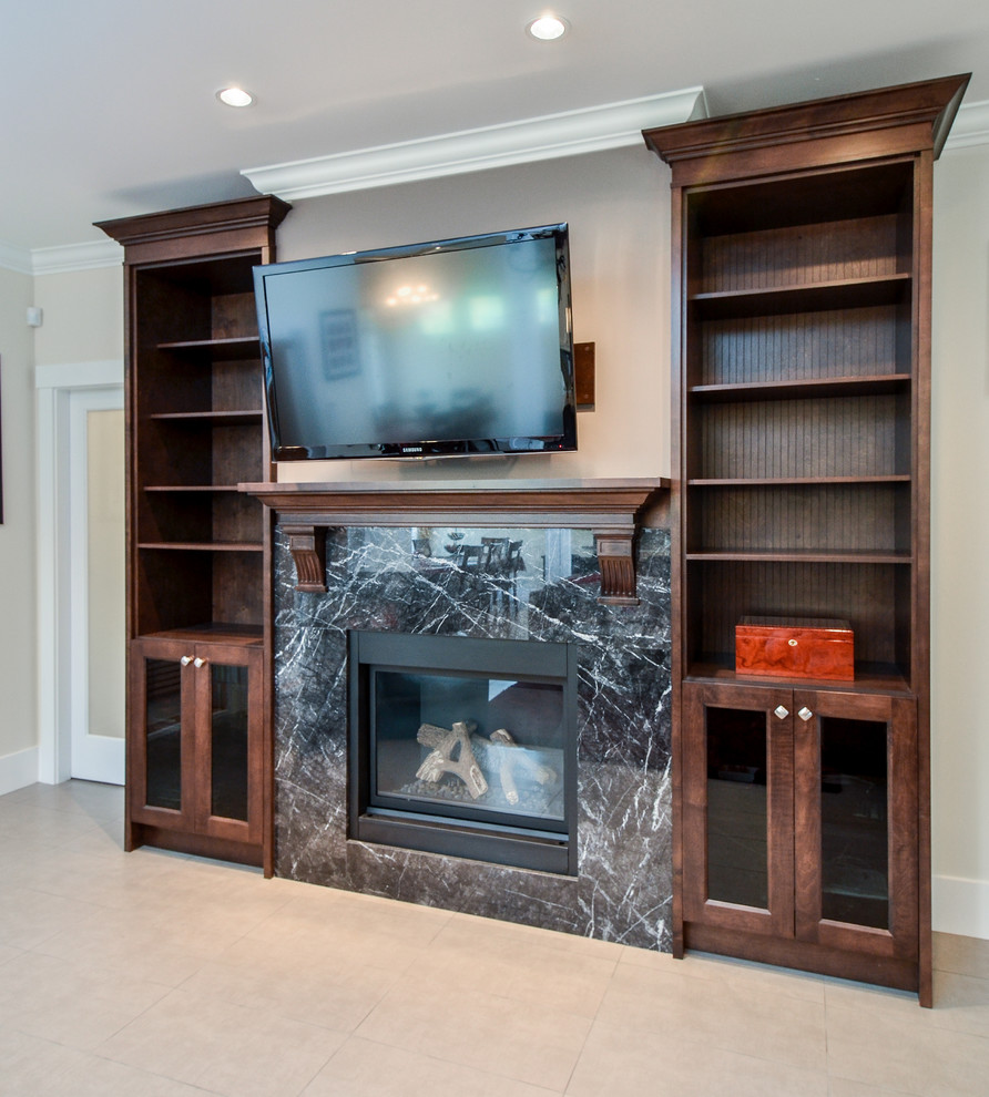 Inspiration for a mid-sized contemporary living room remodel in Vancouver with a standard fireplace and a wall-mounted tv