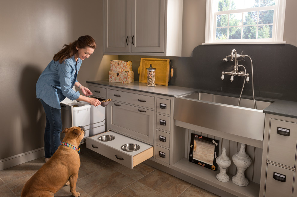 Mid-sized transitional l-shaped travertine floor eat-in kitchen photo in Chicago with a farmhouse sink, shaker cabinets, gray cabinets, wood countertops, green backsplash, stone slab backsplash, stainless steel appliances and an island