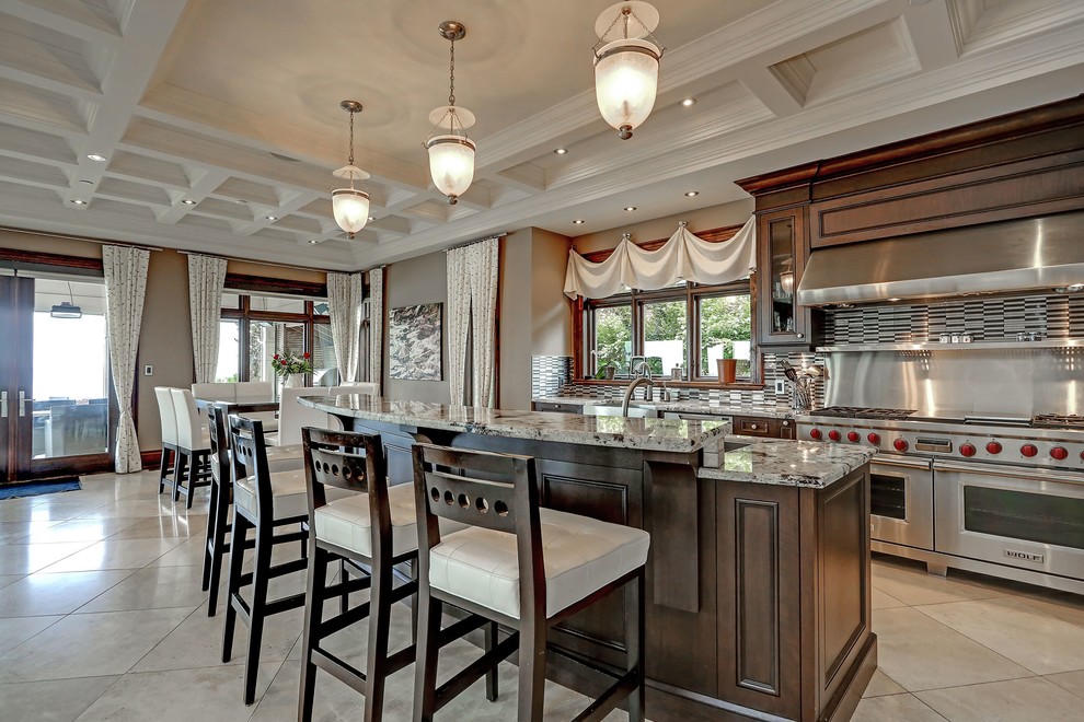 Inspiration for a transitional l-shaped porcelain tile open concept kitchen remodel in Toronto with beaded inset cabinets, dark wood cabinets, marble countertops, metallic backsplash, metal backsplash, stainless steel appliances and an island