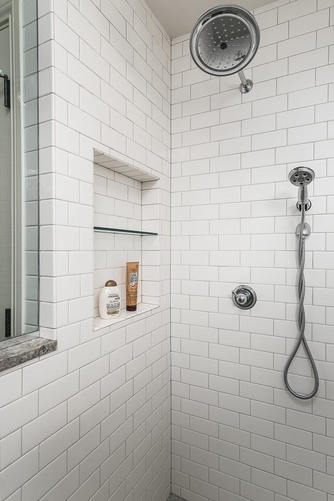 This is an example of a mid-sized transitional master bathroom in Other with flat-panel cabinets, blue cabinets, an open shower, white tile, subway tile, blue walls, porcelain floors, an undermount sink, granite benchtops, grey floor and an open shower.