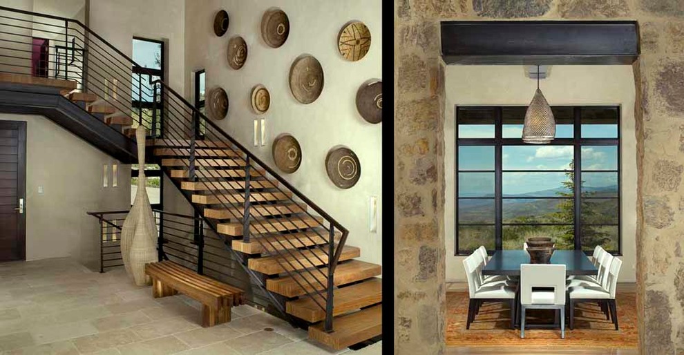 Design ideas for a modern foyer in Denver with travertine floors, a single front door and a dark wood front door.