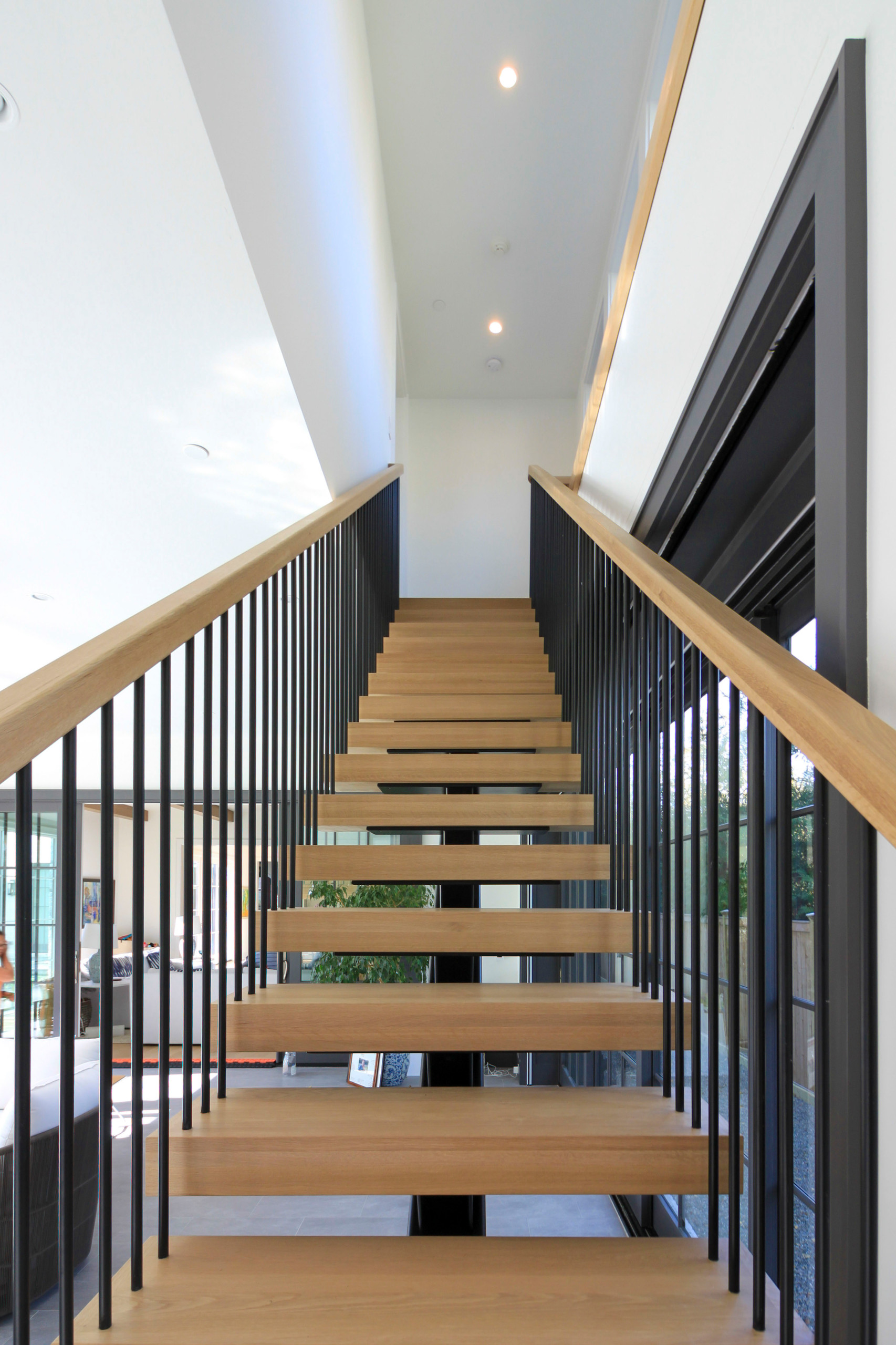 96_Dramatic cantilevered no-riser staircase, Bethesda, MD 20814