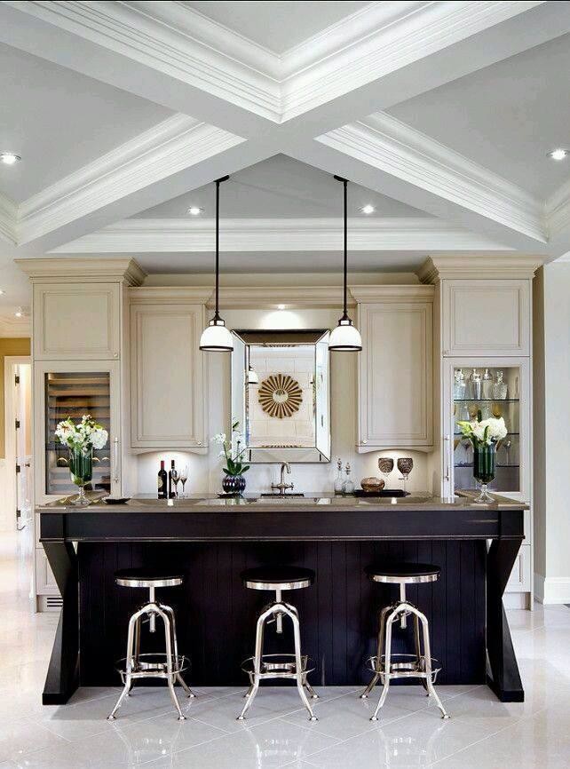 Mid-sized transitional l-shaped white floor kitchen photo in Orange County with an undermount sink, recessed-panel cabinets, beige cabinets, granite countertops, beige backsplash, paneled appliances and an island