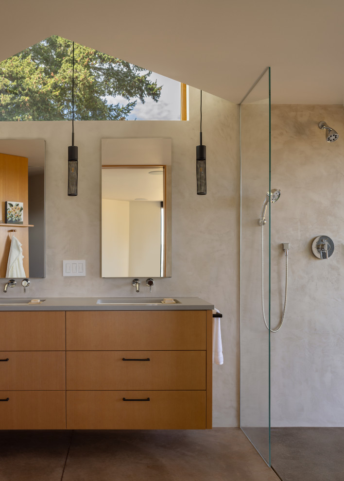 Design ideas for a mid-sized modern master bathroom in Portland with an open shower, an open shower, a double vanity, a floating vanity, flat-panel cabinets, medium wood cabinets, beige walls, concrete floors, an undermount sink, engineered quartz benchtops, grey floor and grey benchtops.