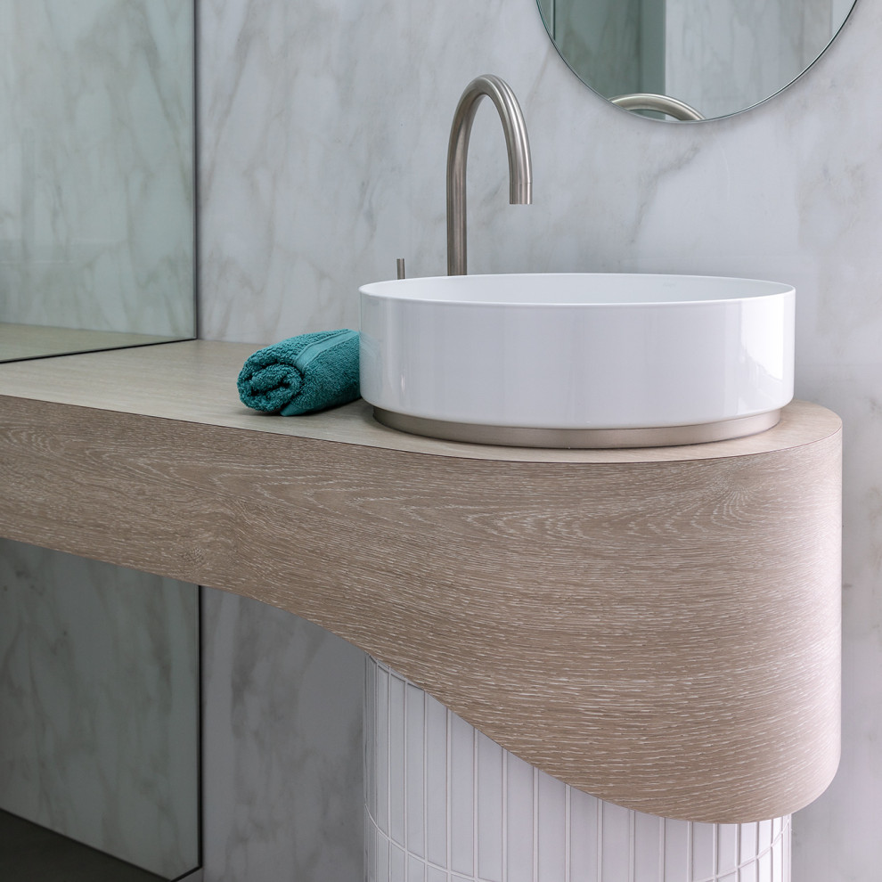 Photo of a small contemporary 3/4 bathroom in Perth with white tile, an open shower, a niche, a single vanity and a freestanding vanity.