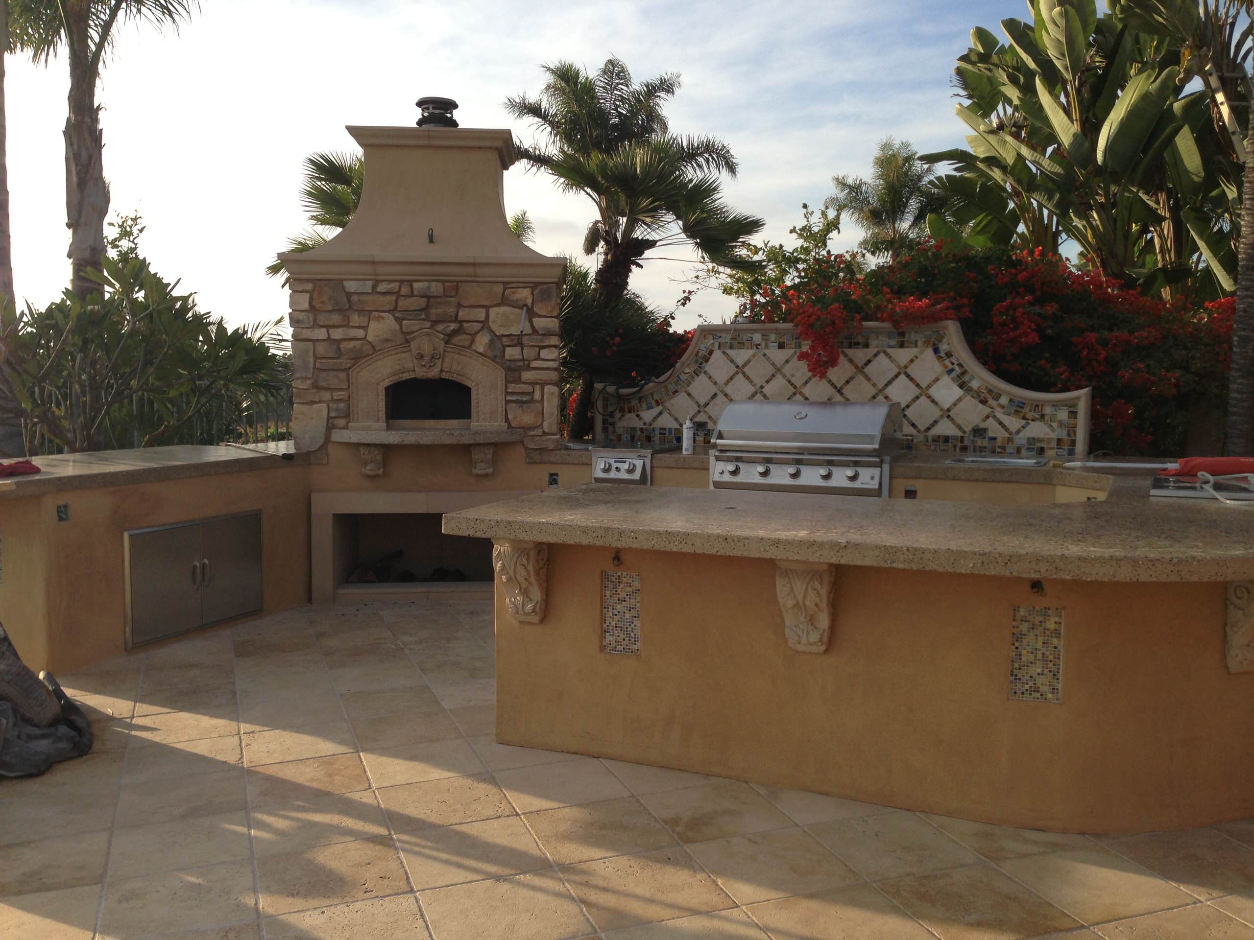 Outdoor Kitchen Island and Tiled Backdrop