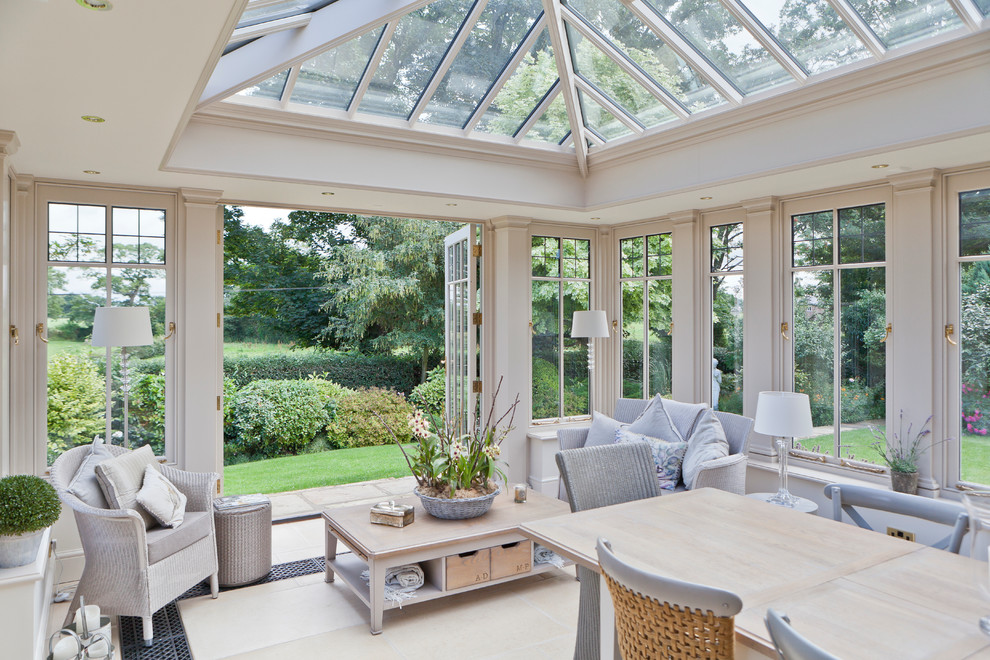 Inspiration for a large traditional sunroom in Other with limestone floors, no fireplace and a glass ceiling.