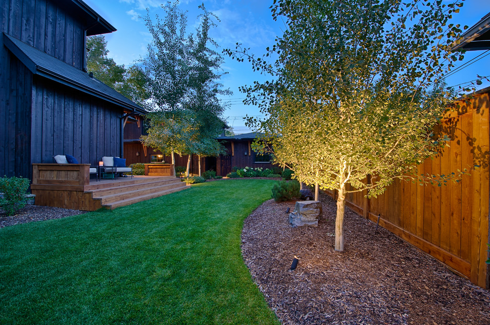 Inspiration for a rustic backyard landscaping in Calgary.