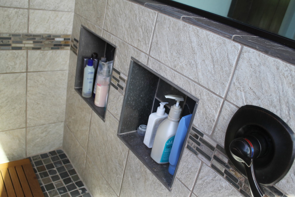 Inspiration for a mid-sized transitional master beige tile and porcelain tile porcelain tile and brown floor walk-in shower remodel in Phoenix with flat-panel cabinets, black cabinets, a two-piece toilet, blue walls, an undermount sink and quartz countertops