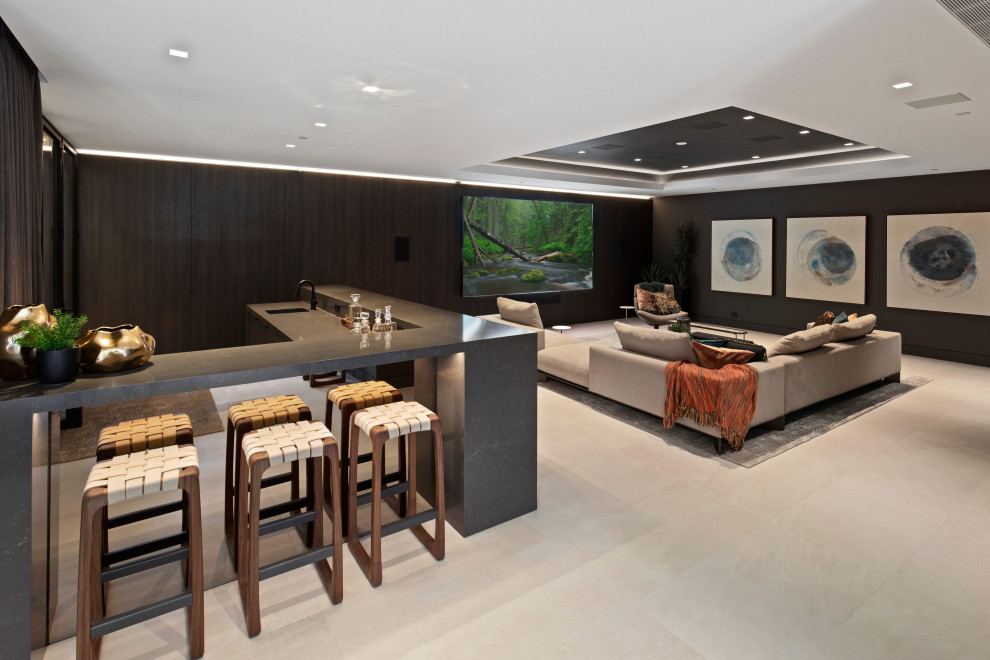 Inspiration for a large contemporary open concept home theatre in San Diego with black walls, a built-in media wall and beige floor.