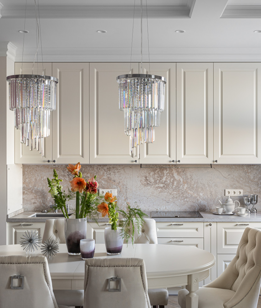 Example of a large transitional l-shaped vinyl floor, brown floor and tray ceiling eat-in kitchen design in Moscow with an undermount sink and raised-panel cabinets