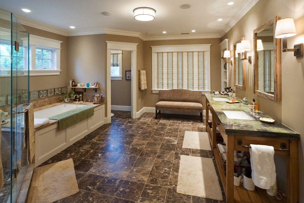Inspiration for an expansive traditional master bathroom in DC Metro with an undermount sink, open cabinets, an undermount tub, a corner shower, brown tile, brown walls and green benchtops.
