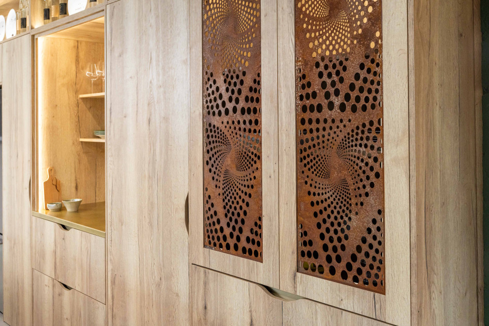 Photo of an expansive urban kitchen/dining room in Kent with brown walls, concrete flooring, grey floors and feature lighting.