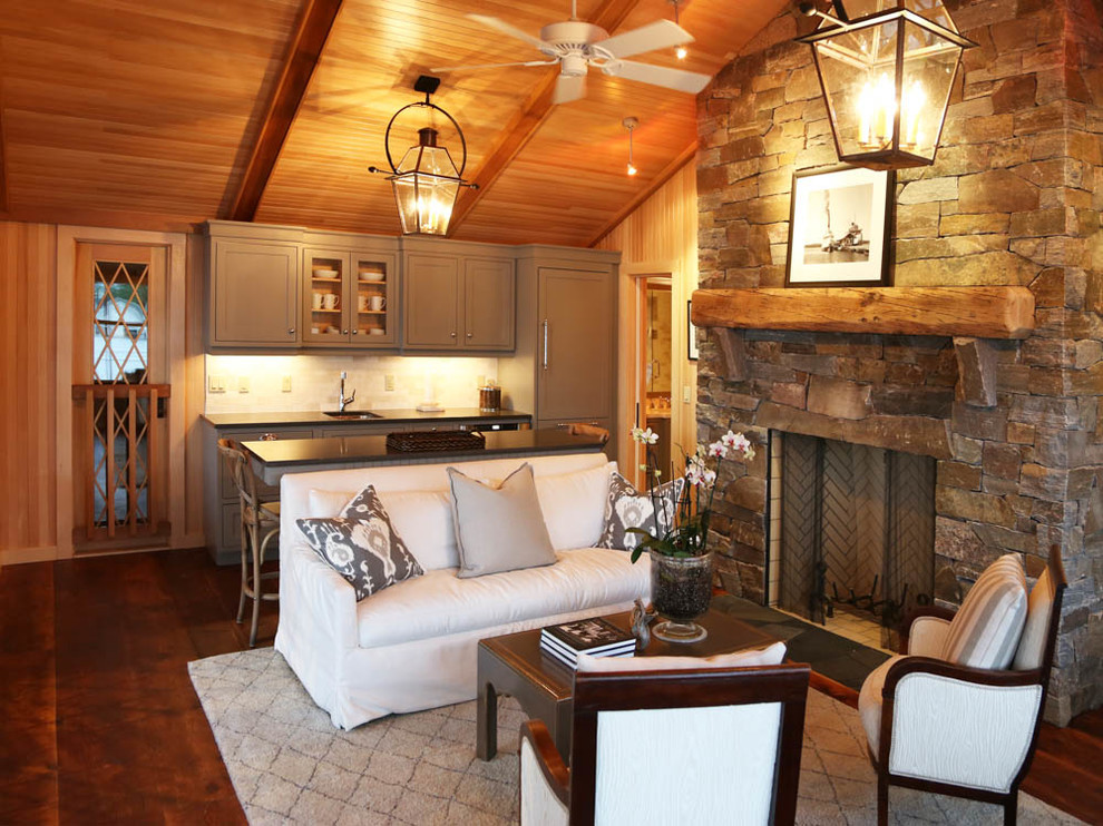 Inspiration for a small country formal open concept living room in Toronto with a standard fireplace, a stone fireplace surround, multi-coloured walls, dark hardwood floors and no tv.