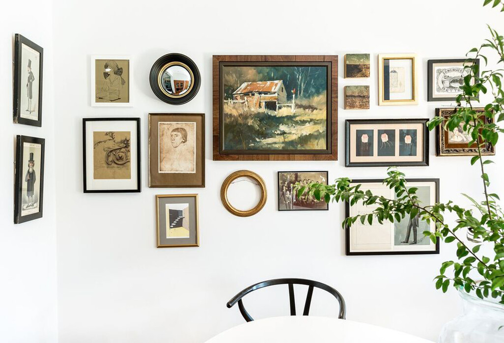 Example of an eclectic dining room design in Seattle
