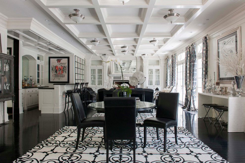 Design ideas for a traditional dining room in New York with white walls, dark hardwood floors and black floor.
