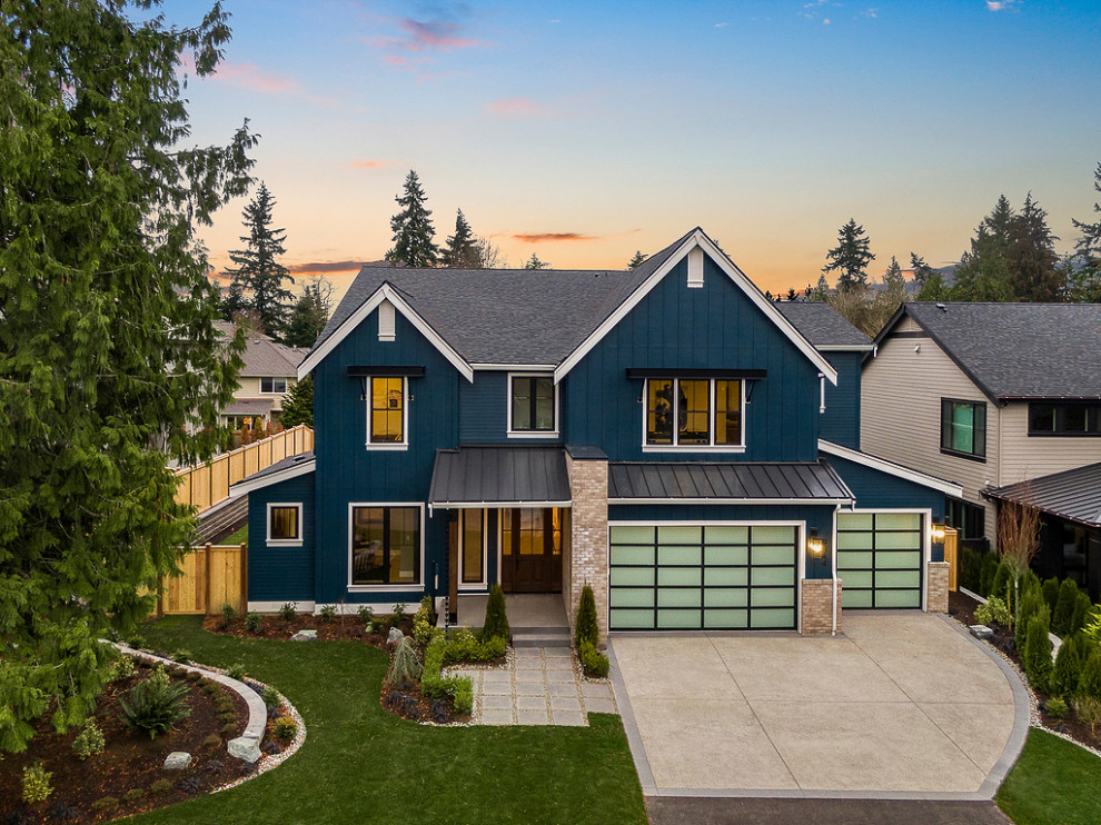 Inspiration for a large and blue country two floor detached house in Seattle with mixed cladding, a pitched roof, a shingle roof, a black roof and board and batten cladding.