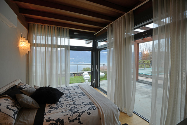 appartamento a Menaggio contemporary-bedroom