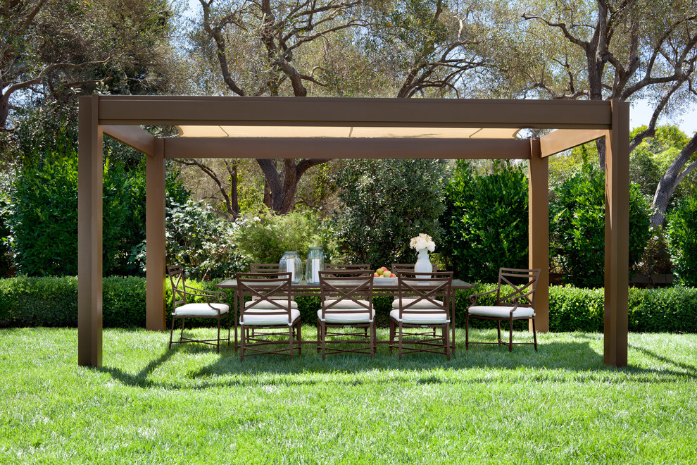 This is an example of a contemporary backyard patio in Los Angeles with a pergola.