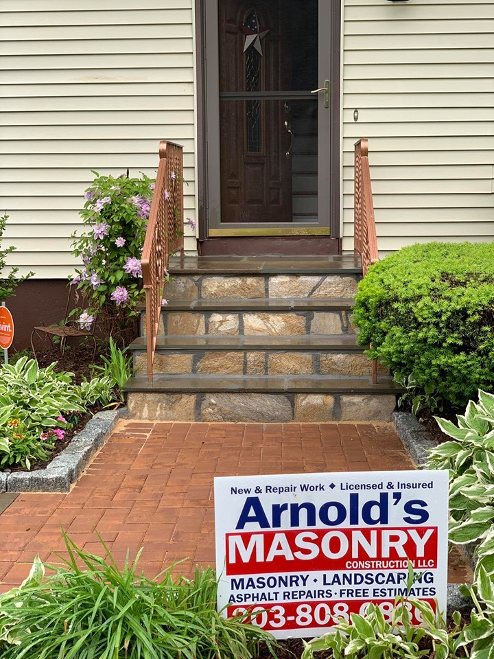 Inspiration for a mid-sized rustic front yard patio remodel