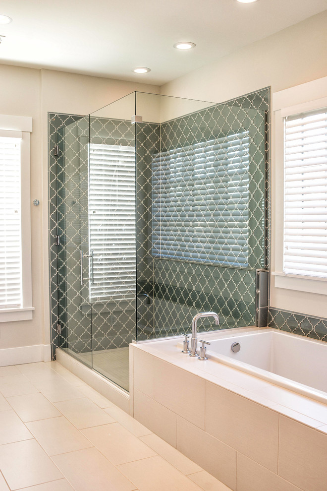 Inspiration for a large transitional master white tile and ceramic tile ceramic tile drop-in bathtub remodel with an undermount sink, flat-panel cabinets, white cabinets, marble countertops and gray walls