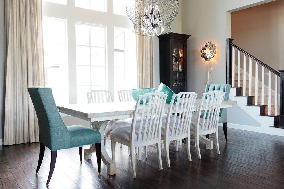 Mid-sized beach style open plan dining in Other with grey walls and dark hardwood floors.
